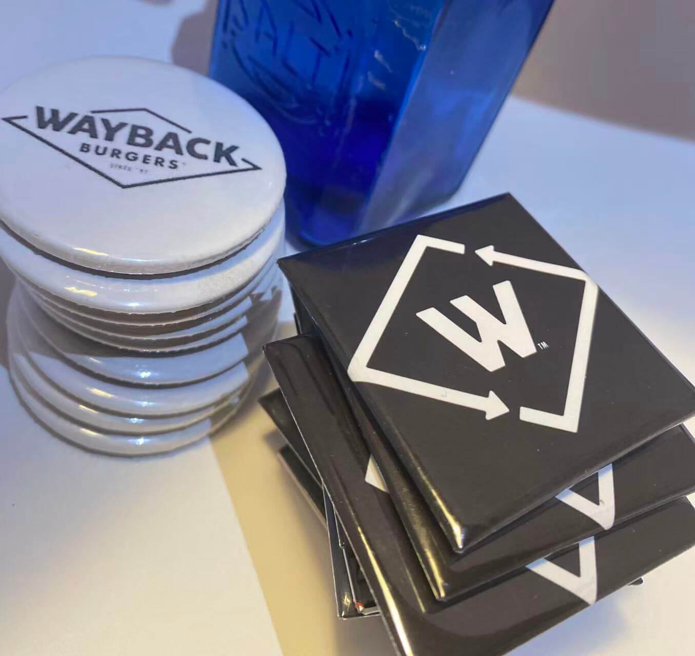 Bulk Orders of 50mm square or round coasters featuring business logo and design.